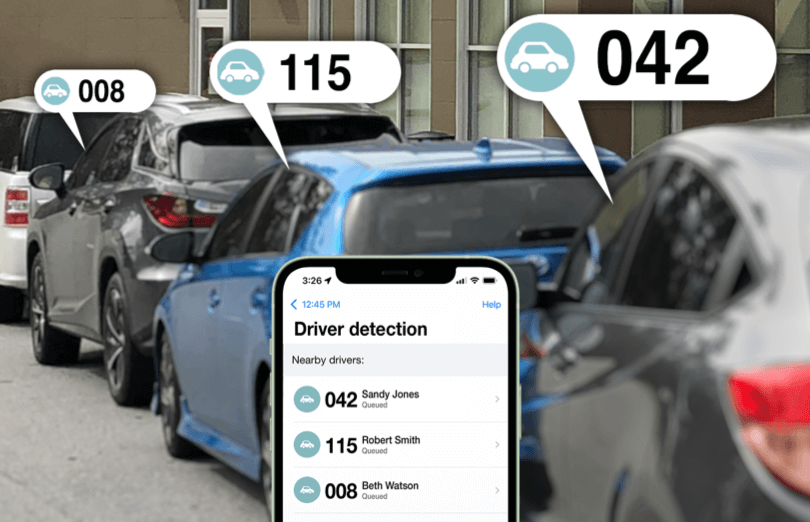Cars wait in the pickup line in the background. A phone is in the foreground, displaying a list of the drivers in line.